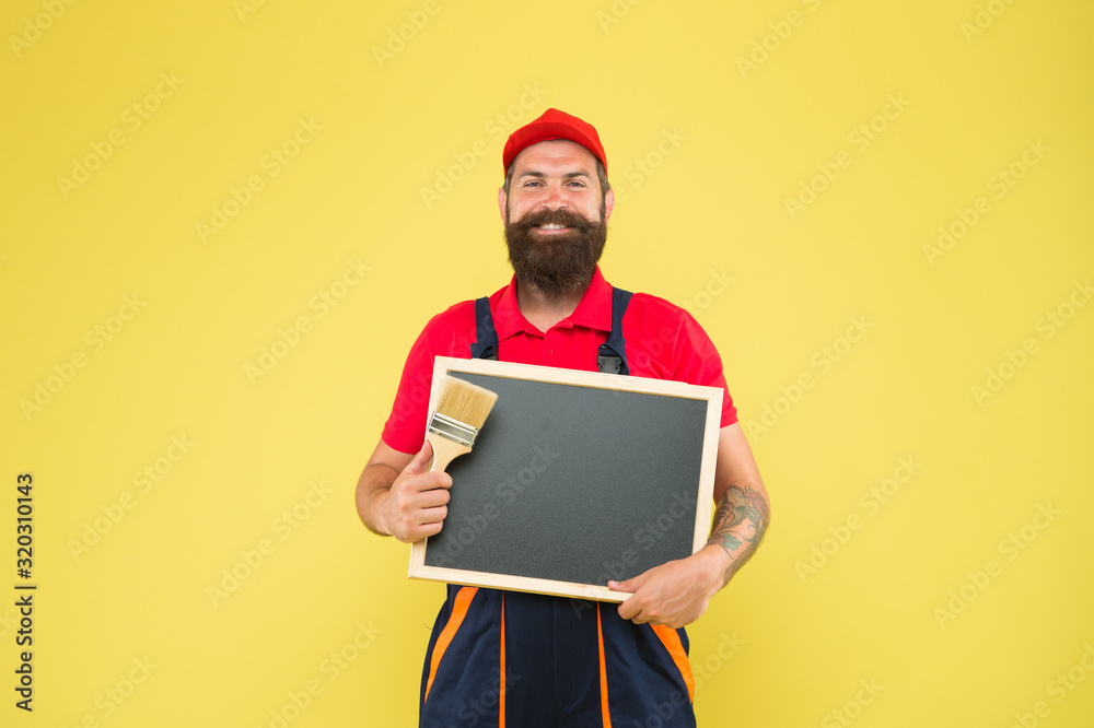 turnkey project. announcement and advertisement. copy space. professional repairer wanted. builder man paint on blackboard. bearded worker painting brush. brutal builder man start own business turnkey project. announcement and advertisement. copy space. professional repairer wanted. builder man paint on blackboard. bearded worker painting brush. brutal builder man start own business