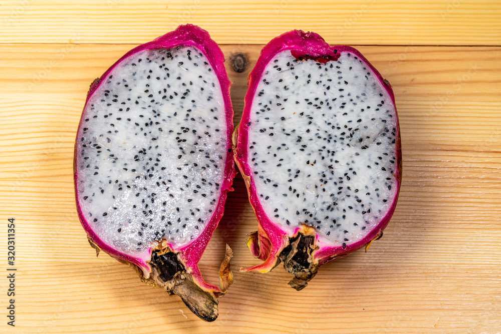 Pitaya or dragon fruit on wooden background Pitaya or dragon fruit on wooden background