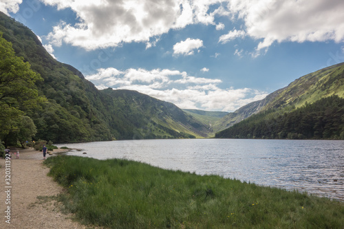 Upper Lake at Glendalough, County Wicklow, Ireland. The Glendalough valley is located in Wicklow Mountains National Park and is home to an Early Medieval monastic settlement. 