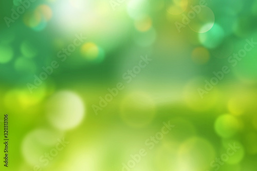 Spring or summer background blur - abstract banner - green blurred bokeh lights