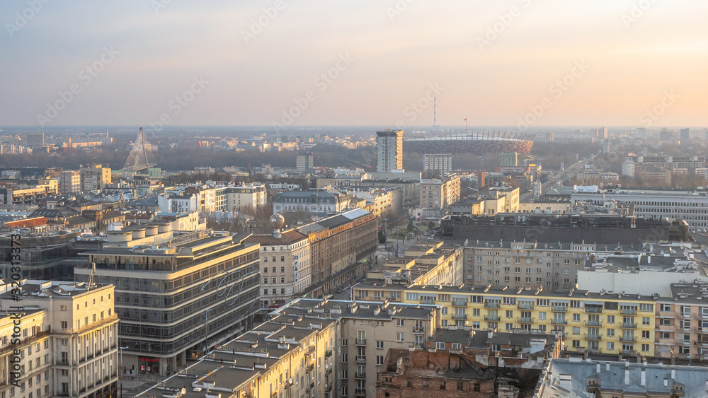 Warsaw panorama with stadium at sunrise.