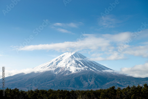 Fuji mountain with snow cover on the top with could, Japan