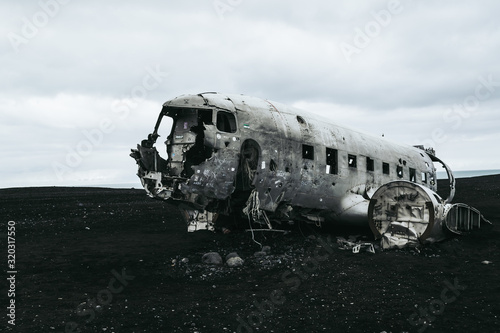 Wrecked plane on the black sand beach in Iceland.