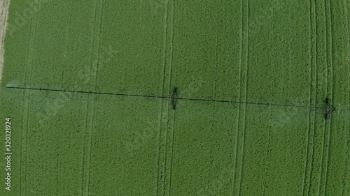 View from above of a Watering System on a field. Agrobusiness, Agrofood, Agrotech. photo