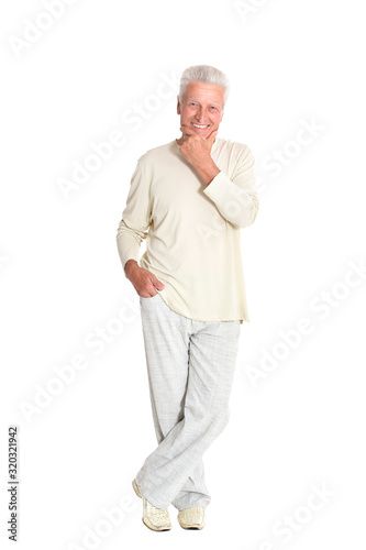 Senior man posing isolated on white background, full length