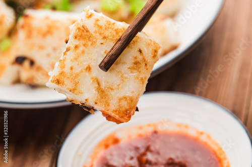 Turnip cake and xo sauce stir fried with tea，radish cake, turnip cake, photo