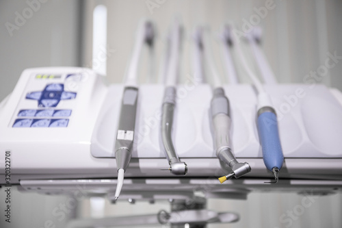 The workplace of the dentist with the dental unit and chair  close-up