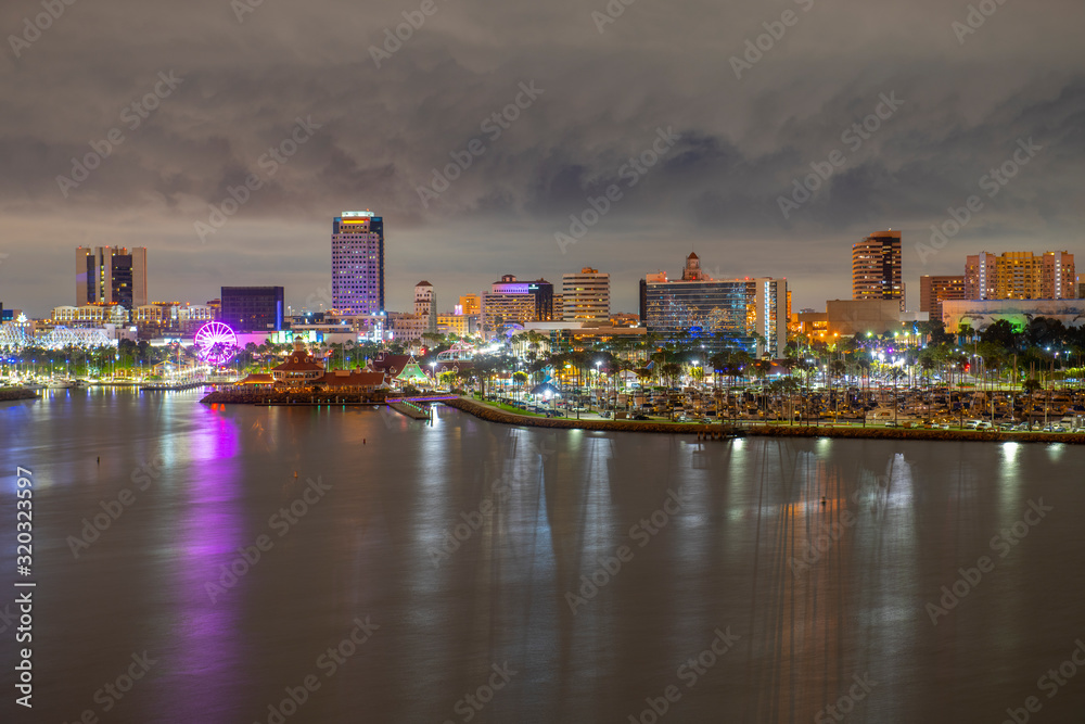 Fototapeta premium Long Beach modern city skyline, marina and Shoreline Village at night in City of Long Beach, Los Angeles County, California CA, USA.