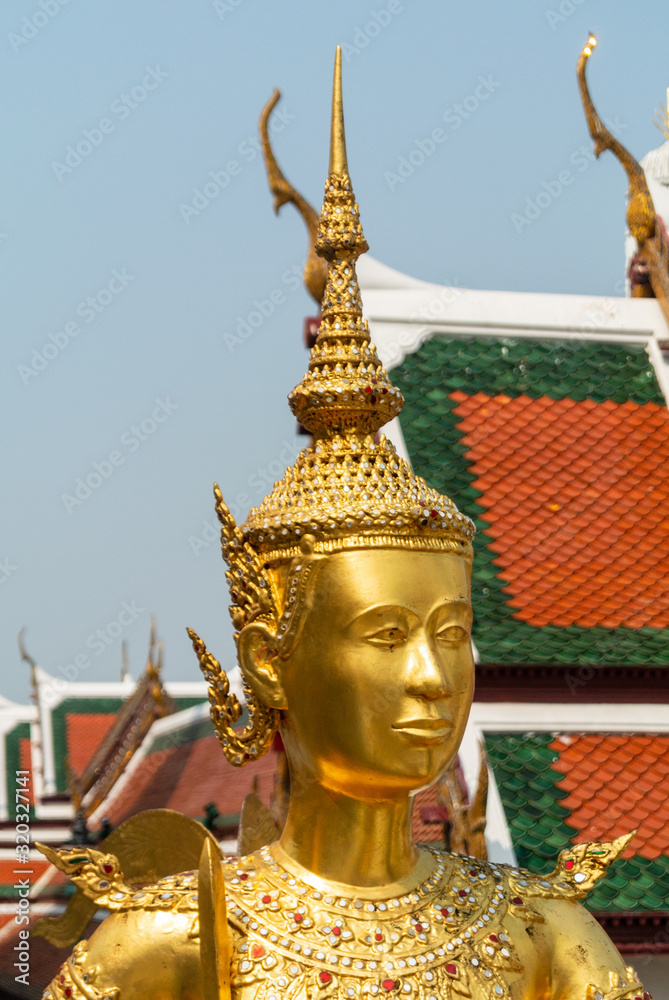 golden statue in temble of  bangkok thailand