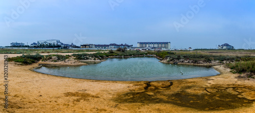 a salty firth near the sea beach