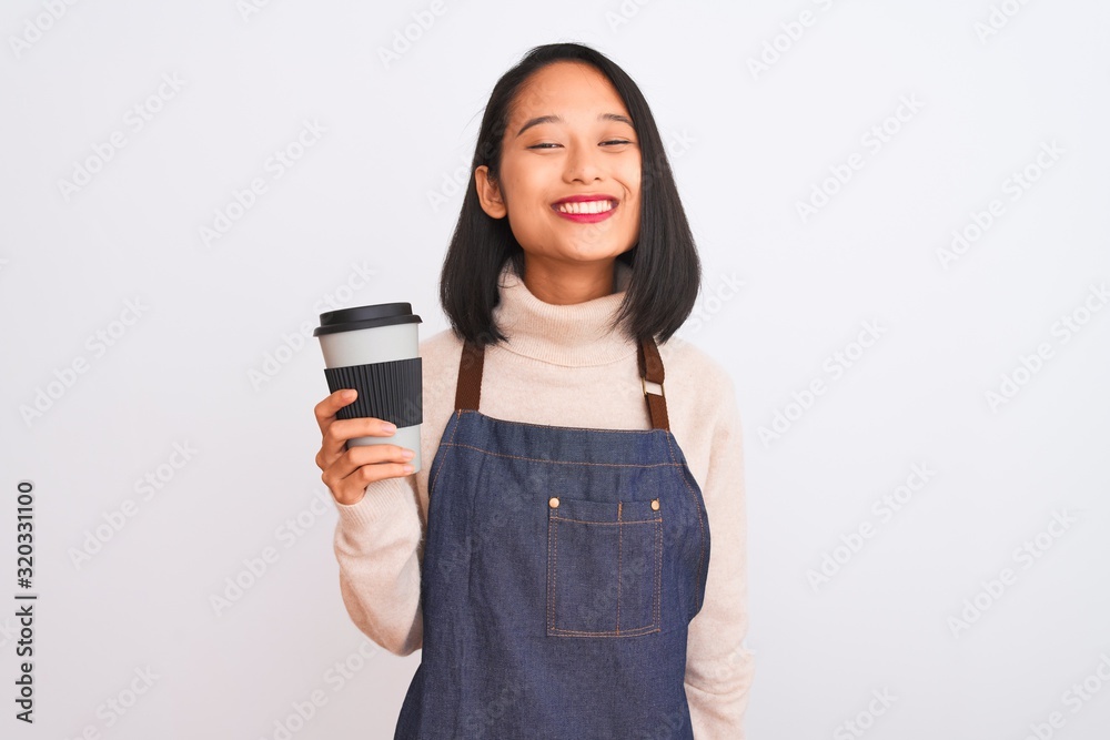 Beautiful barista chinese woman wearing apron holding coffee over isolated white background with a happy face standing and smiling with a confident smile showing teeth Beautiful barista chinese woman wearing apron holding coffee over isolated white background with a happy face standing and smiling with a confident smile showing teeth