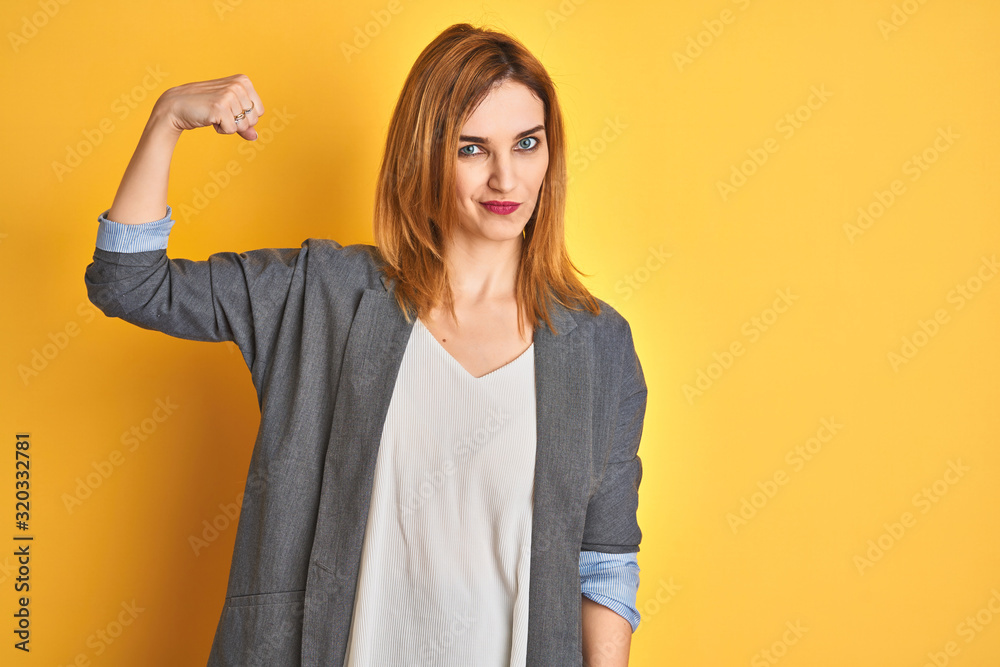Redhead caucasian business woman over yellow isolated background tired rubbing nose and eyes feeling fatigue and headache. Stress and frustration concept. Redhead caucasian business woman over yellow isolated background tired rubbing nose and eyes feeling fatigue and headache. Stress and frustration concept.