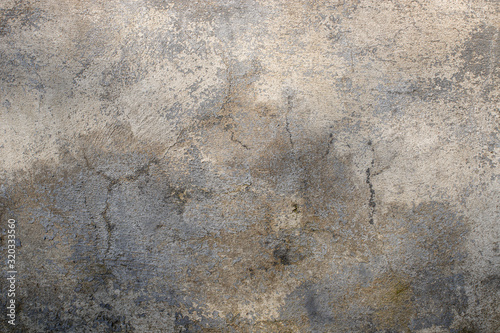 Concrete gray texture background. cracked cement wall of heterogeneous color.