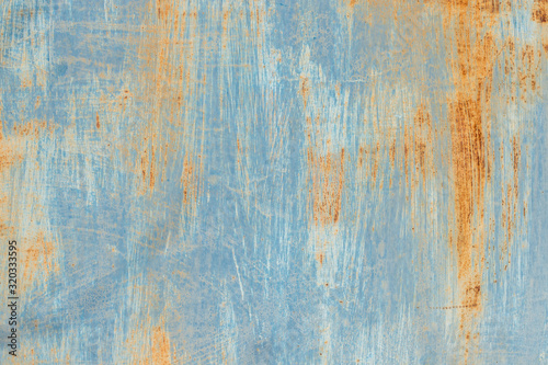 blue painted metal with rusty shabby texture. Old grunge vintage background