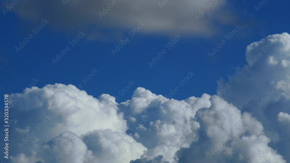 timelapse White clouds on a blue sky background. Blue sky white clouds background timelapse. Beautiful weather at cloudy heaven. Sky background timelapse White clouds on a blue sky background. Blue sky white clouds background timelapse. Beautiful weather at cloudy heaven. Sky background