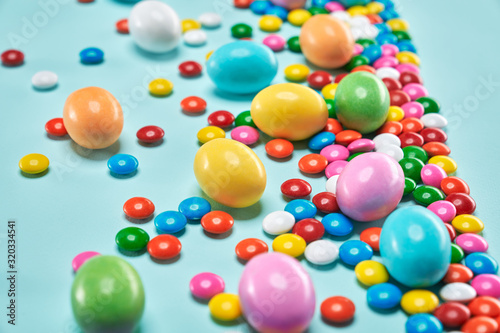 Peanut chocolate balls in colorful sugar shell.