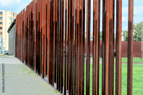 rusty iron bar close up at the berlin wall