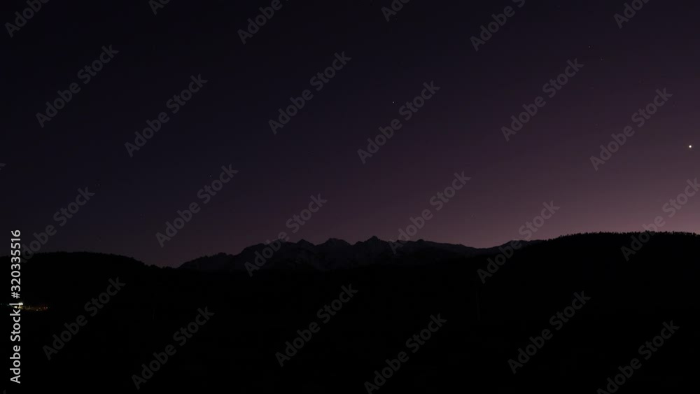 Time lapse of massive mountains and nature and the night falling down Time lapse of massive mountains and nature and the night falling down
