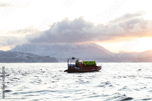 Fotografi rib boat in the Arctic polar sea for excursions and whale and cetacean observation