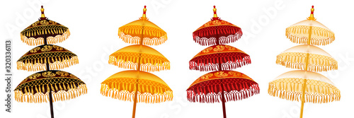Colorful Balinese traditional religious three-tiered umbrellas set isolated on white background, vector decoration illustration