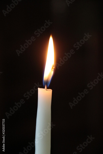 Burning candle flame Candlemas celebration