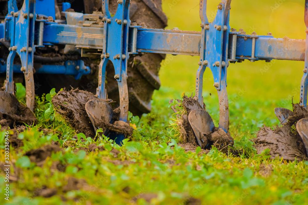 Fototapeta premium farmer plowing his fields in early spring