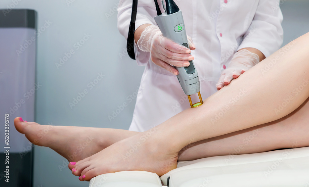 Laser hair removal. Laser procedure in a cosmetology clinic Laser hair removal. Laser procedure in a cosmetology clinic