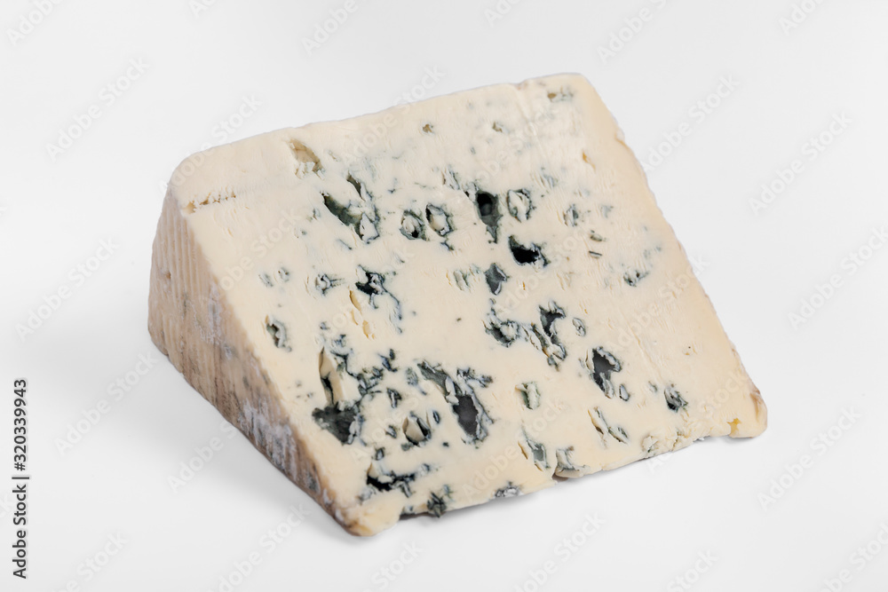 french cow's milk cheese called Bleu d'Auvergne isolated on white background