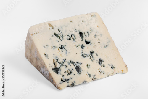 french cow's milk cheese called Bleu d'Auvergne isolated on white background