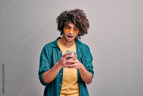 Student arab with smartphone