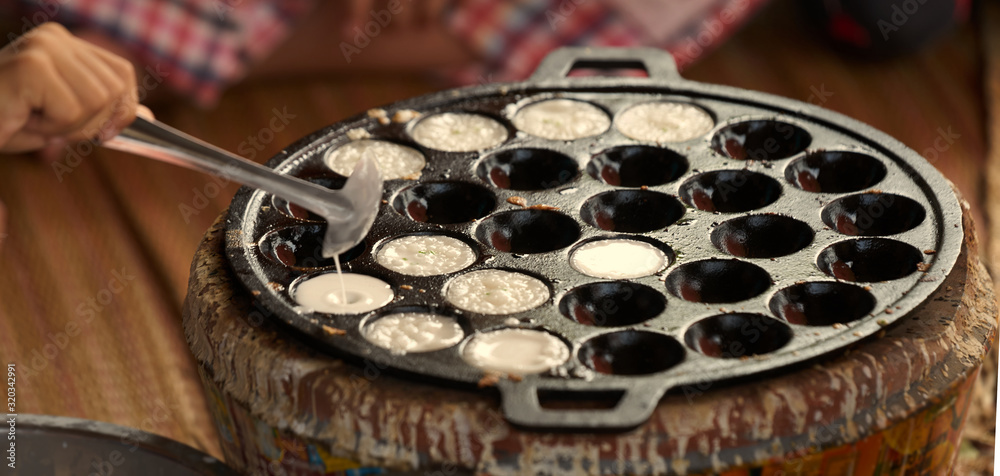 Thai sweetmeat in mini pan stove in cooking Thai sweetmeat in mini pan stove in cooking