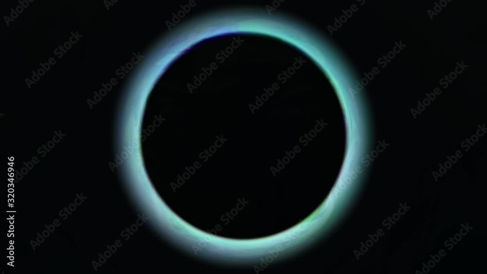 Glowing swirl. Lunar eclipse. Blue circle radiance motion on black background.