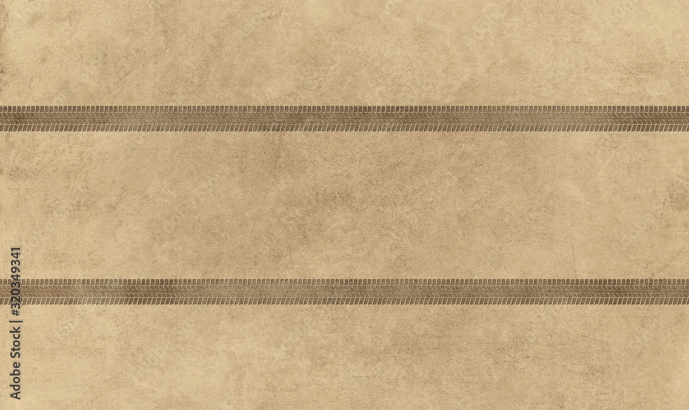 Fototapeta premium Traces of car treads on a sandy background.