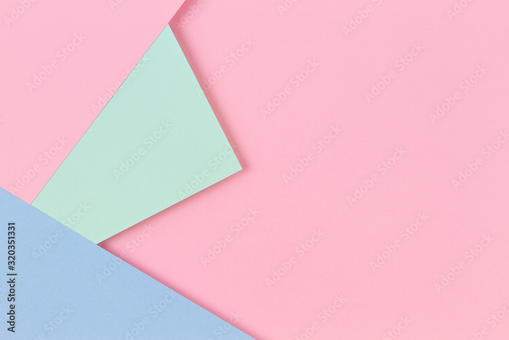 Abstract colored paper texture background. Minimal geometric shapes and lines in pastel pink, light blue and green colours Abstract colored paper texture background. Minimal geometric shapes and lines in pastel pink, light blue and green colours