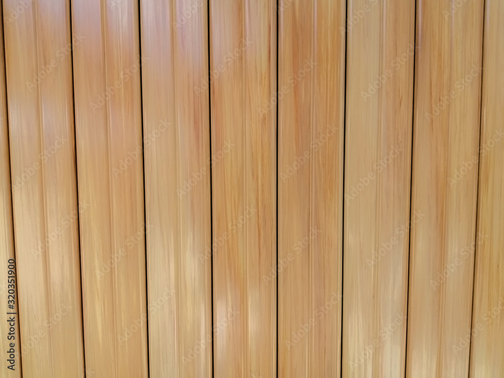 fake wood panel texture or imitation in oak-colored plastic with horizontal lines fake wood panel texture or imitation in oak-colored plastic with horizontal lines