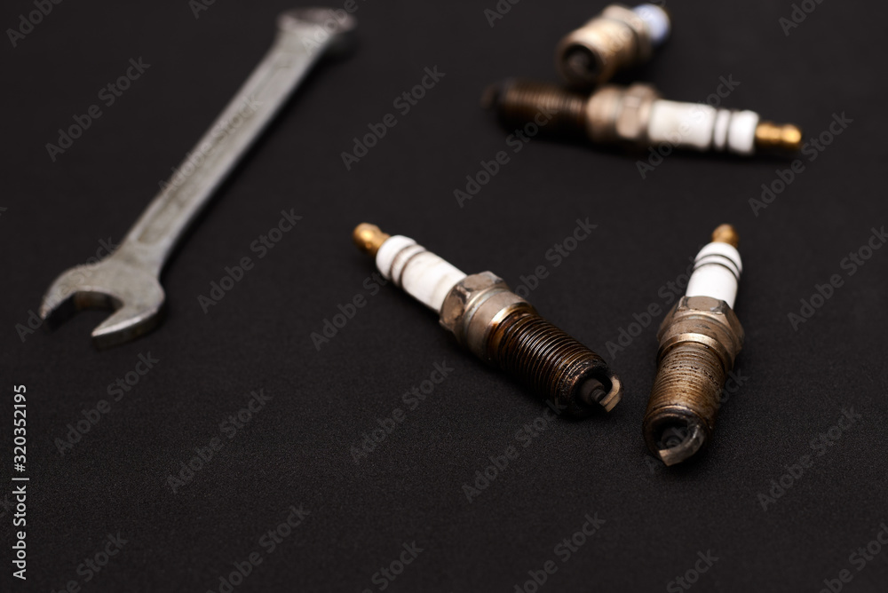 car candles bad with soot and wrench car candles bad with soot and wrench