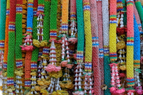 Thai belief in worshiping sacred and unseen things such as ghosts  godfather  goddesses and spirits. By using 7 color garlands to decorate shrines  trees and other places according to belief