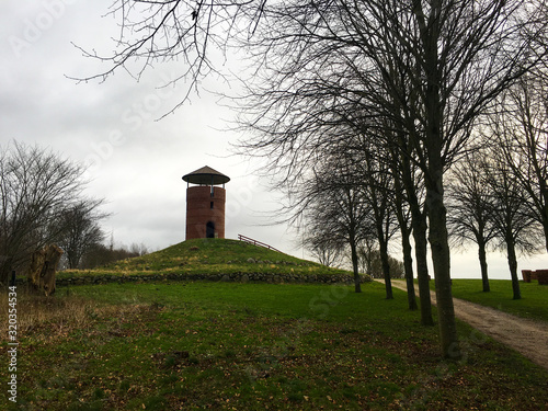 Brick lookout Tower. Round Tower observatory ,Rundetaarn, shot from below. Located in central Copenhagen, Denmark. Today it is a tourist attraction photo