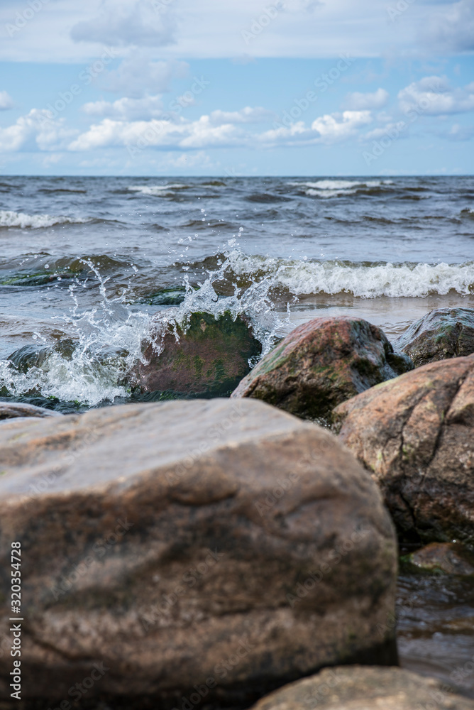 sea waves crushing on mole 