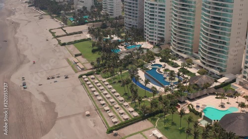 Aerial View of Acapulco Beach, Mexico, Hotels and Resorts on Waterfront photo