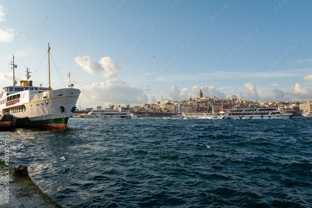 Karakoy/Beyoglu district, Galata Port, Galata Tower and city ​​lines ships, Istanbul, Turkey.