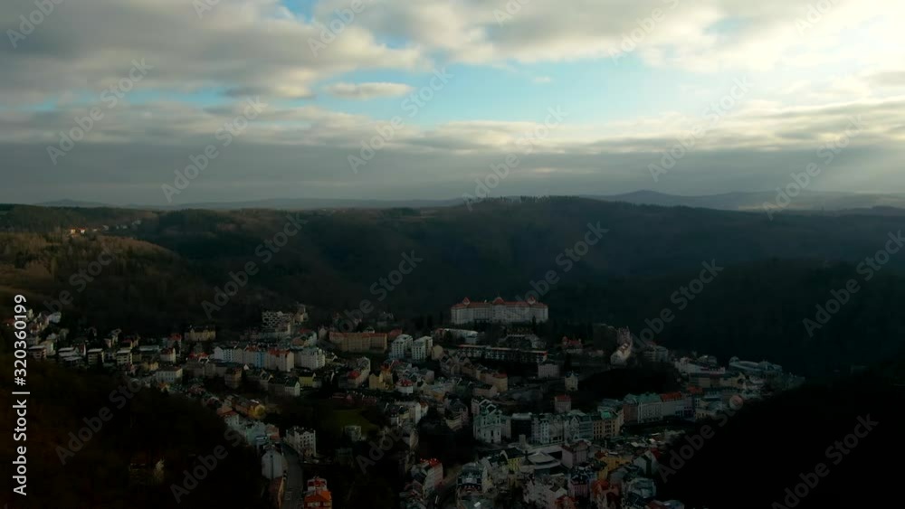 aerial view of Pine trees forest on cold winter morning with early warm sunlight european city aerial view of Pine trees forest on cold winter morning with early warm sunlight european city