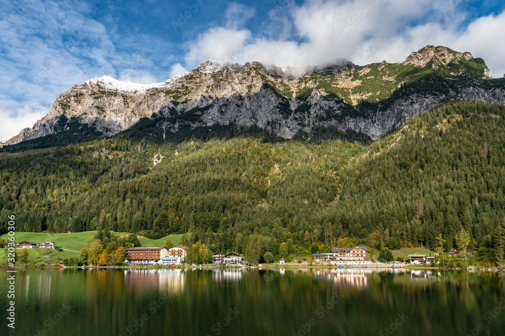Panorama view Hintersee Lake Alps mountain beautiful reflection tree meadow house in background, clear water, national park, Konigssee (Koenigsee) lake, Ramsau in Berchtesgaden, Bavaria, Germany