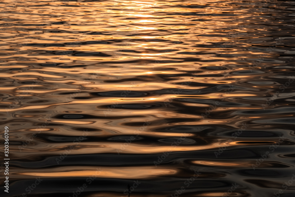 reflection of sun in water