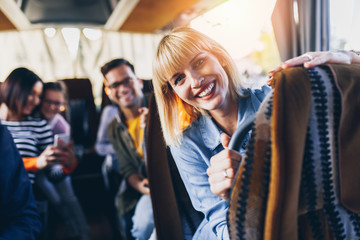 Happy passengers traveling by bus.