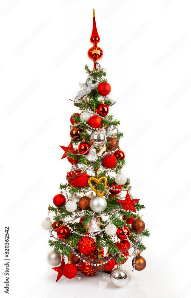 Christmas tree decorated with balls, stars and other decorations, on a white background.