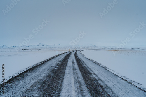 Winter landscape of a beautiful and frozen Iceland. Tourism in Iceland is very popular even over the winter months and still has a lot to offer