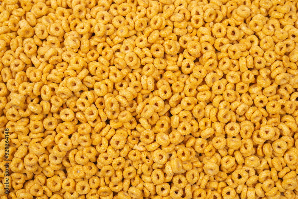 Corn-flakes background and texture. Top view. Corn-flakes background and texture. Top view.