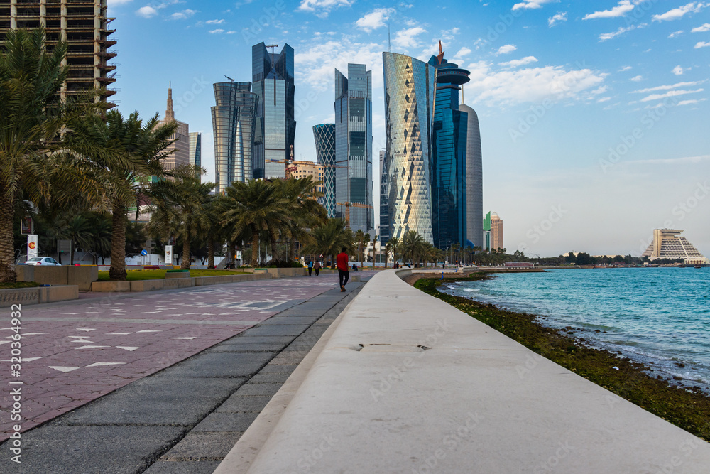 Naklejka premium Doha cor niche Daylight view with skylines and clouds in sky in background