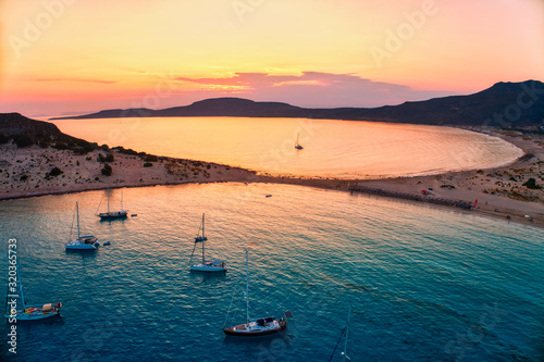 Fototapeta Naklejka Na Ścianę i Meble -  Aerial view of Simos beach at sunset in Elafonisos island in Greece